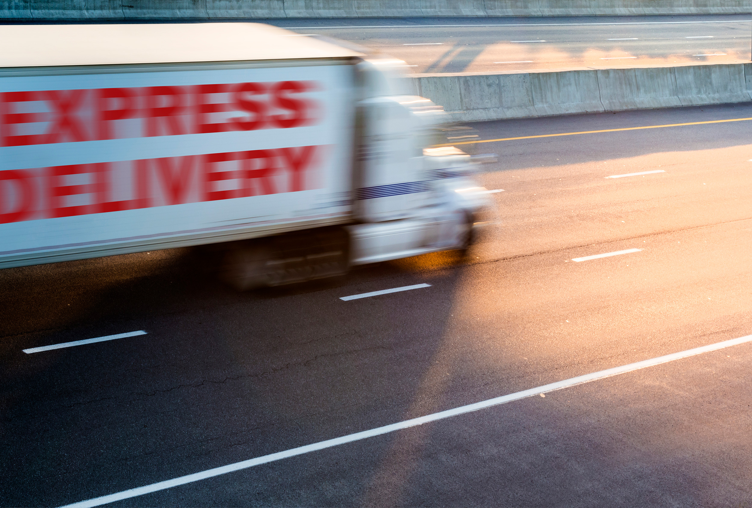 A truck with the words "Express Delivery" on the side zooms down the highway. If you're hurt in an accident with a delivery truck, Shaffer & Shaffer West Virginia lawyers can help.