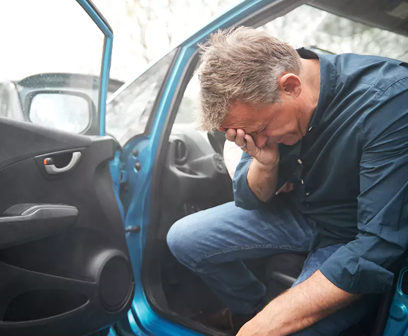 A man in distress, just having been involved in a logging truck accident.